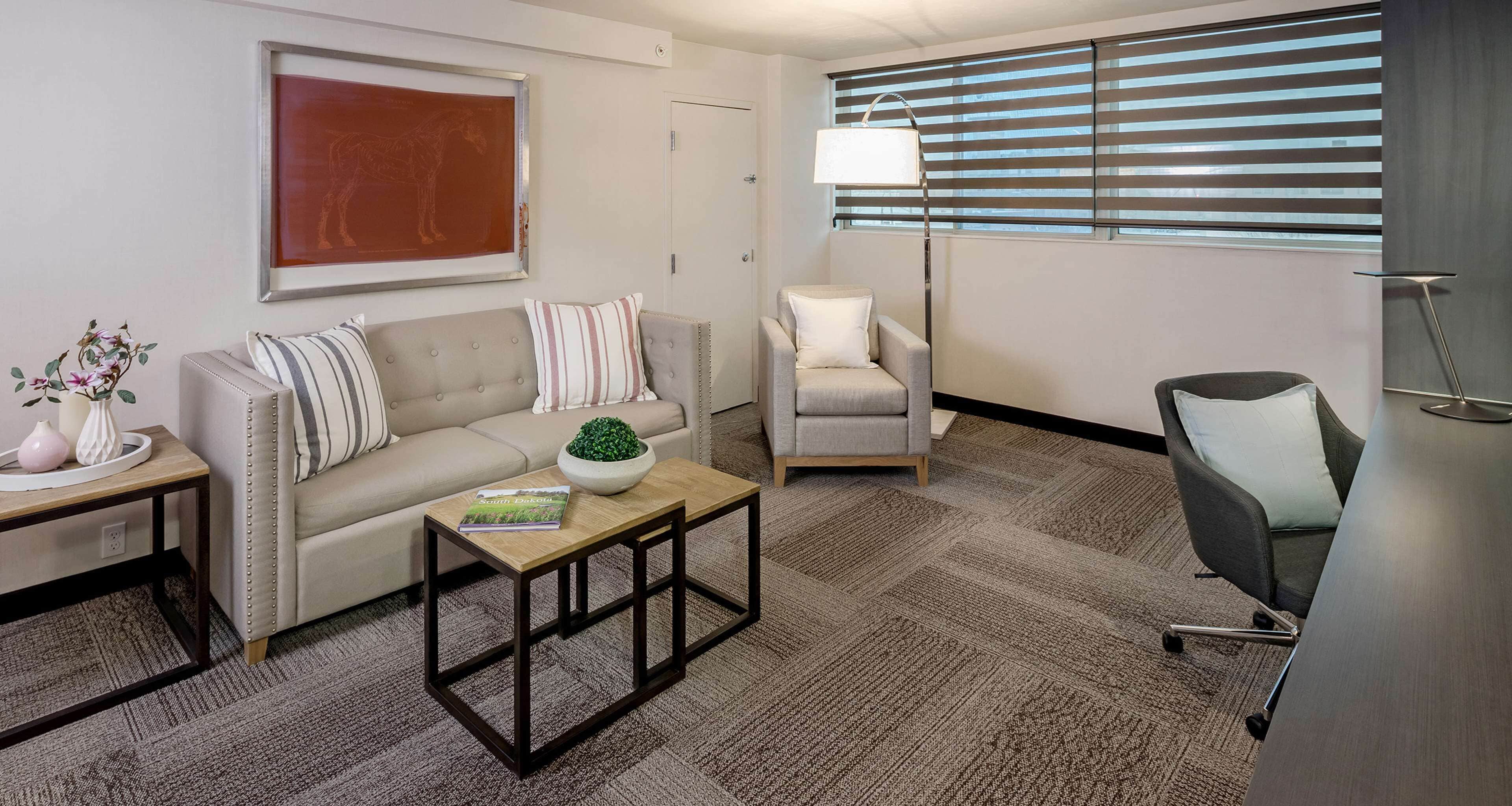 suite, 1 king bed, non smoking, refrigerator (living room;with sofabed) | premium bedding, pillow-top beds, laptop workspace, iron/ironing board