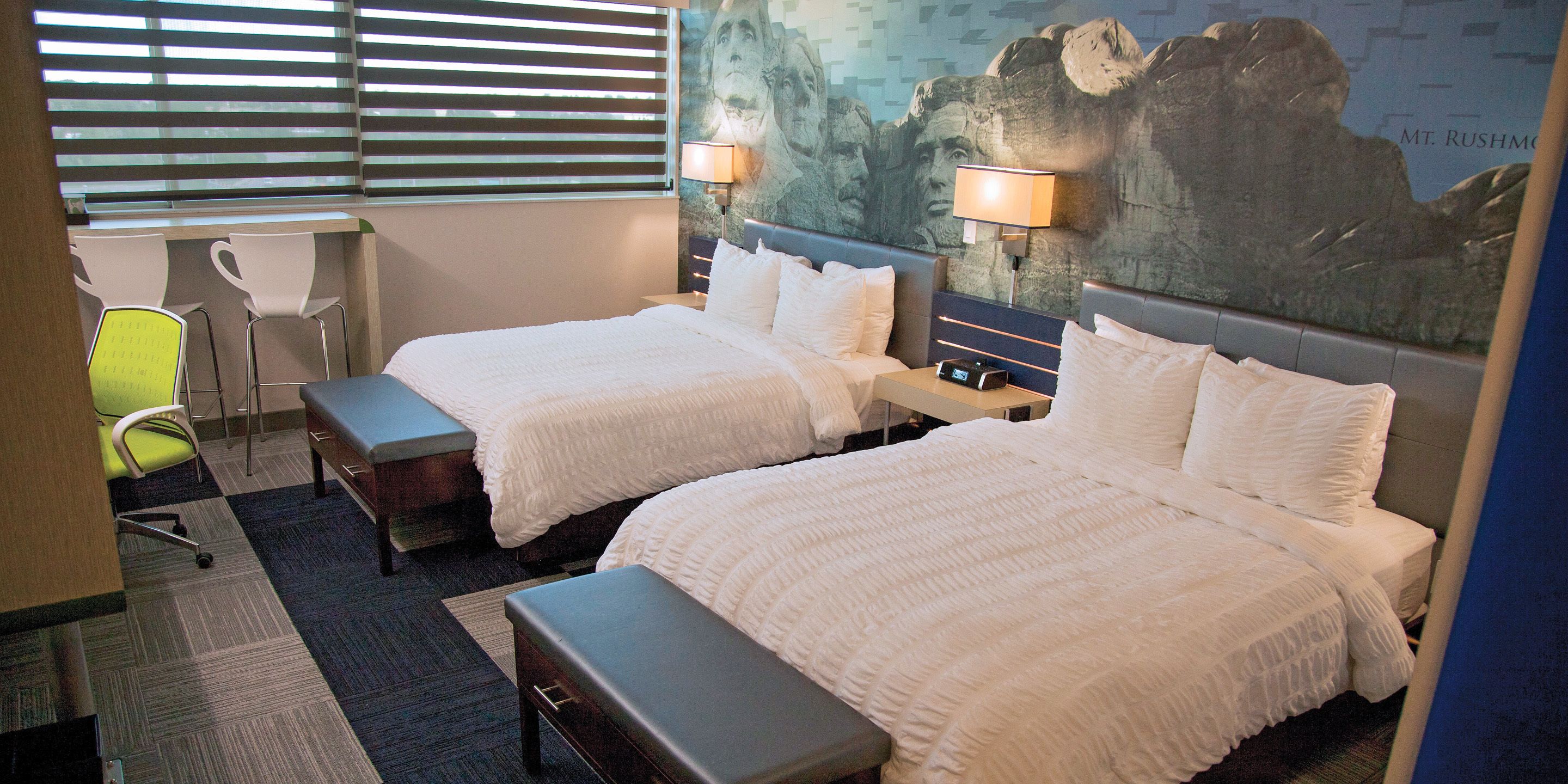 premium bedding, pillow-top beds, laptop workspace, iron/ironing board