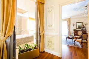 Premium bedding, down comforters, memory foam beds, minibar