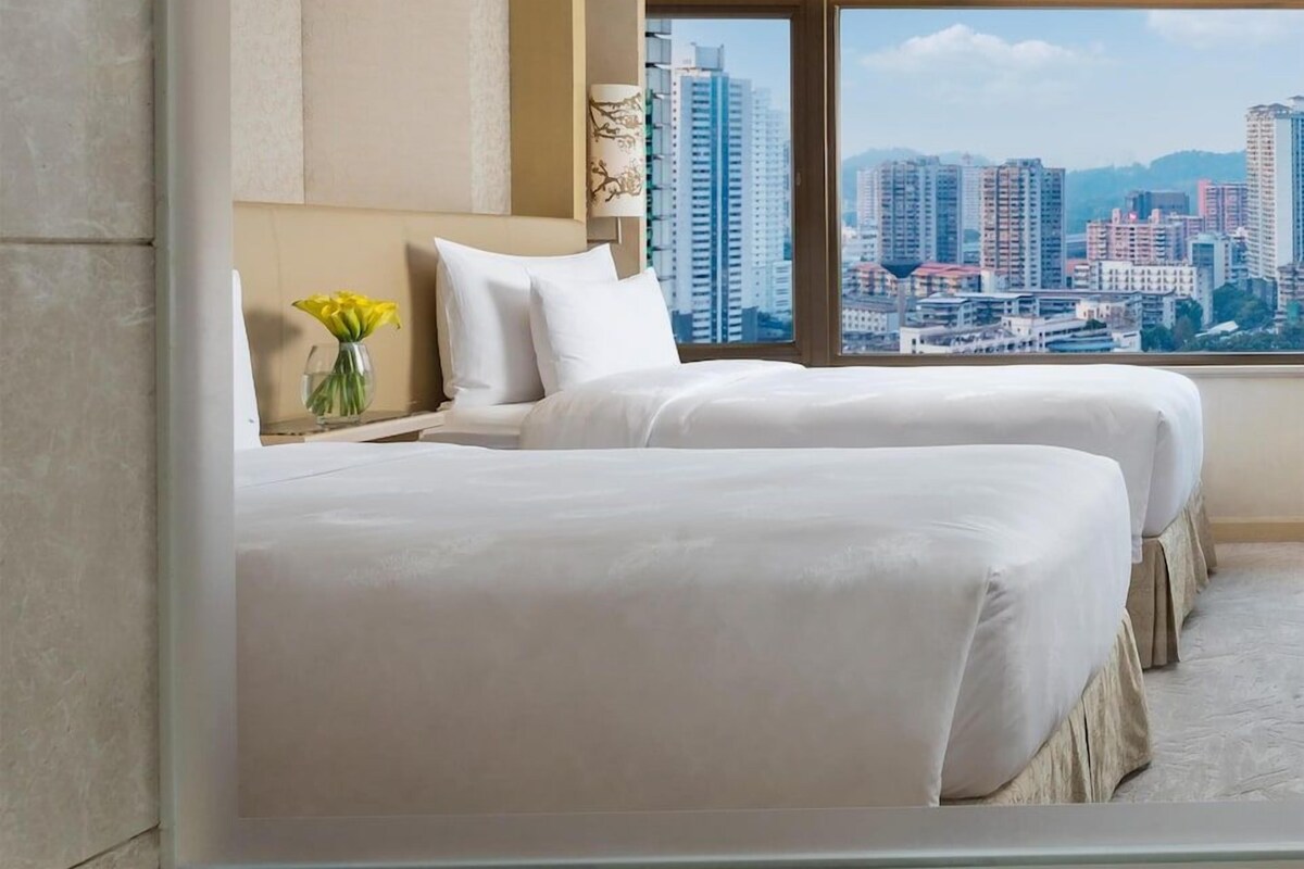 Ropa de cama de alta calidad y minibar 