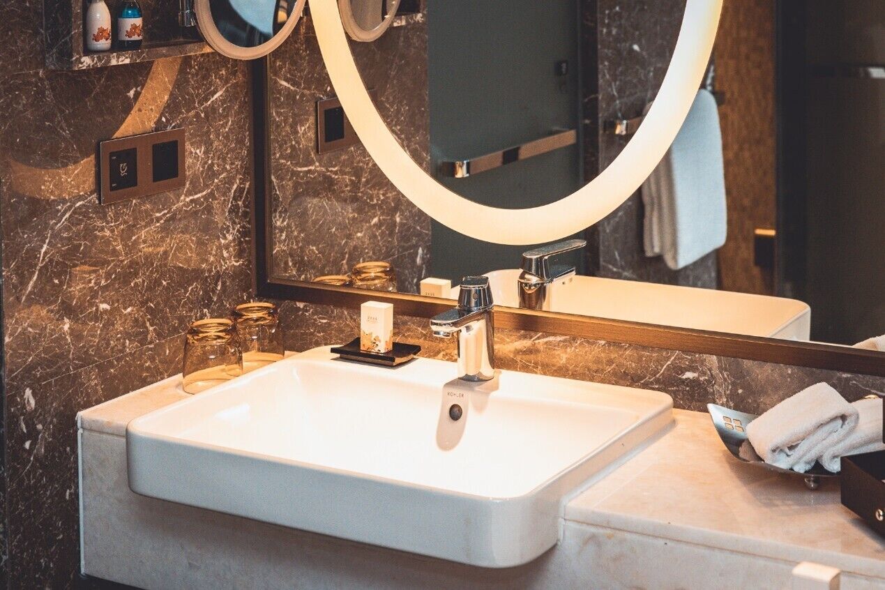 separate bathtub and shower, rainfall showerhead, hair dryer, bathrobes