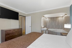 Suite, 1 cama King size, para no fumadores, hidromasaje (with Sofabed) | Camas con pillow-top, caja de seguridad en la habitación y escritorio 