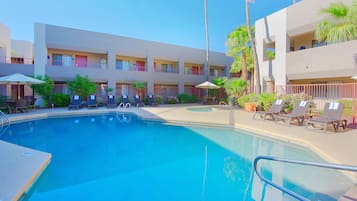 Outdoor pool, pool umbrellas, pool loungers