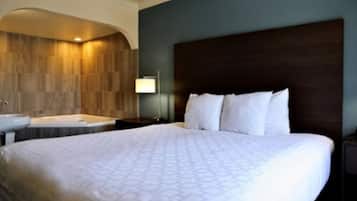 Suite, 1 King Bed, Non Smoking, Jetted Tub (with Sofabed) | Pillowtop beds, in-room safe, desk, laptop workspace