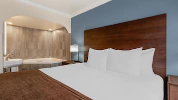 Suite, 1 King Bed, Non Smoking, Jetted Tub (with Sofabed) | Pillowtop beds, in-room safe, desk, laptop workspace
