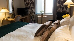 Frigobar, escrivaninha, quartos à prova de som, Wi-Fi de cortesia
