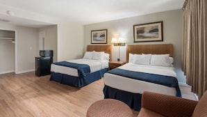 A hotel room with two beds, a desk, a chair, a TV, and a wardrobe. - Americas Best Value Inn Painted Post (Painted Post)