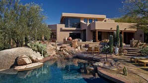 A modern house with a pool, surrounded by cacti and desert plants. - Boulders Resort & Spa Scottsdale, Curio Collection by Hilton (Scottsdale)
