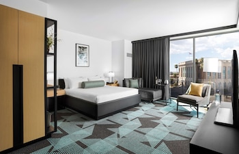 Gallery Tower Studio King | Pillowtop beds, in-room safe, blackout drapes, iron/ironing board at Downtown Grand Las Vegas