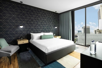 Pillowtop beds, in-room safe, blackout drapes, iron/ironing board at Downtown Grand Las Vegas