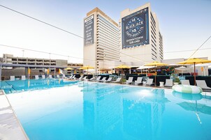 Outdoor pool, open 9:00 AM to 7:00 PM, cabanas (surcharge)