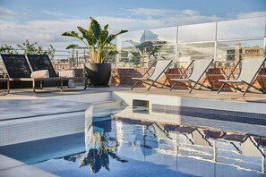 Outdoor pool, open 10:00 AM to 8:00 PM, pool umbrellas, sun loungers