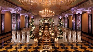 A grand hall with a checkered floor, ornate columns, and a large chandelier. - The US Grant, a Luxury Collection Hotel, San Diego (San Diego)