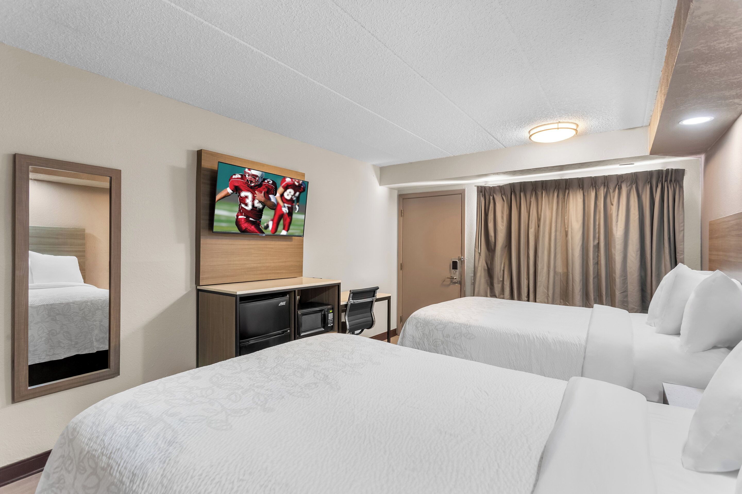 Desk, blackout drapes, soundproofing, iron/ironing board