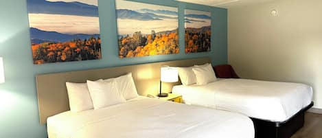 Desk, laptop workspace, blackout drapes, iron/ironing board