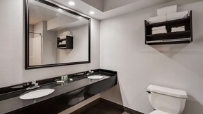 Designer toiletries, hair dryer, towels, soap