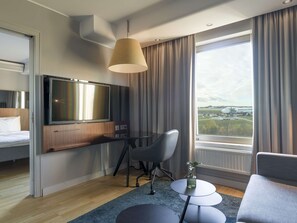 Suite, 1 Bedroom, Sauna | Living area | Flat-screen TV, pay movies