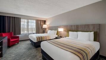 Hypo-allergenic bedding, pillowtop beds, desk, blackout drapes