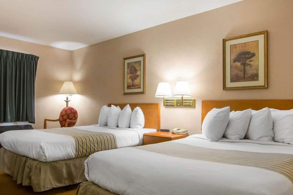 Premium bedding, desk, blackout drapes, iron/ironing board