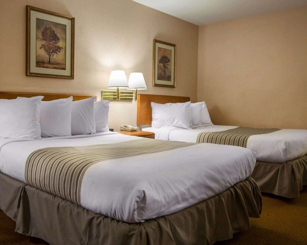 Premium bedding, desk, blackout drapes, iron/ironing board - Econo Lodge Inn & Suites Columbus near Fort Benning (Columbus)