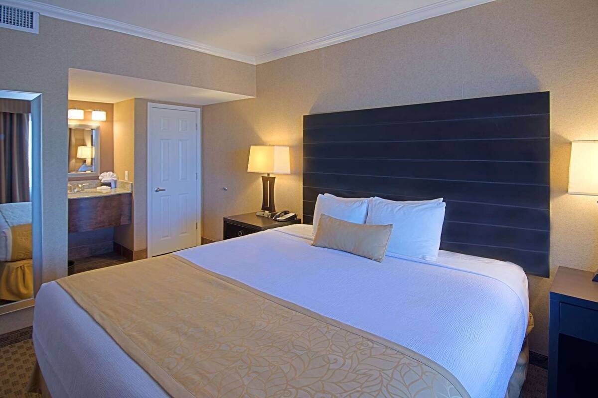 Premium bedding, pillow-top beds, desk, laptop workspace