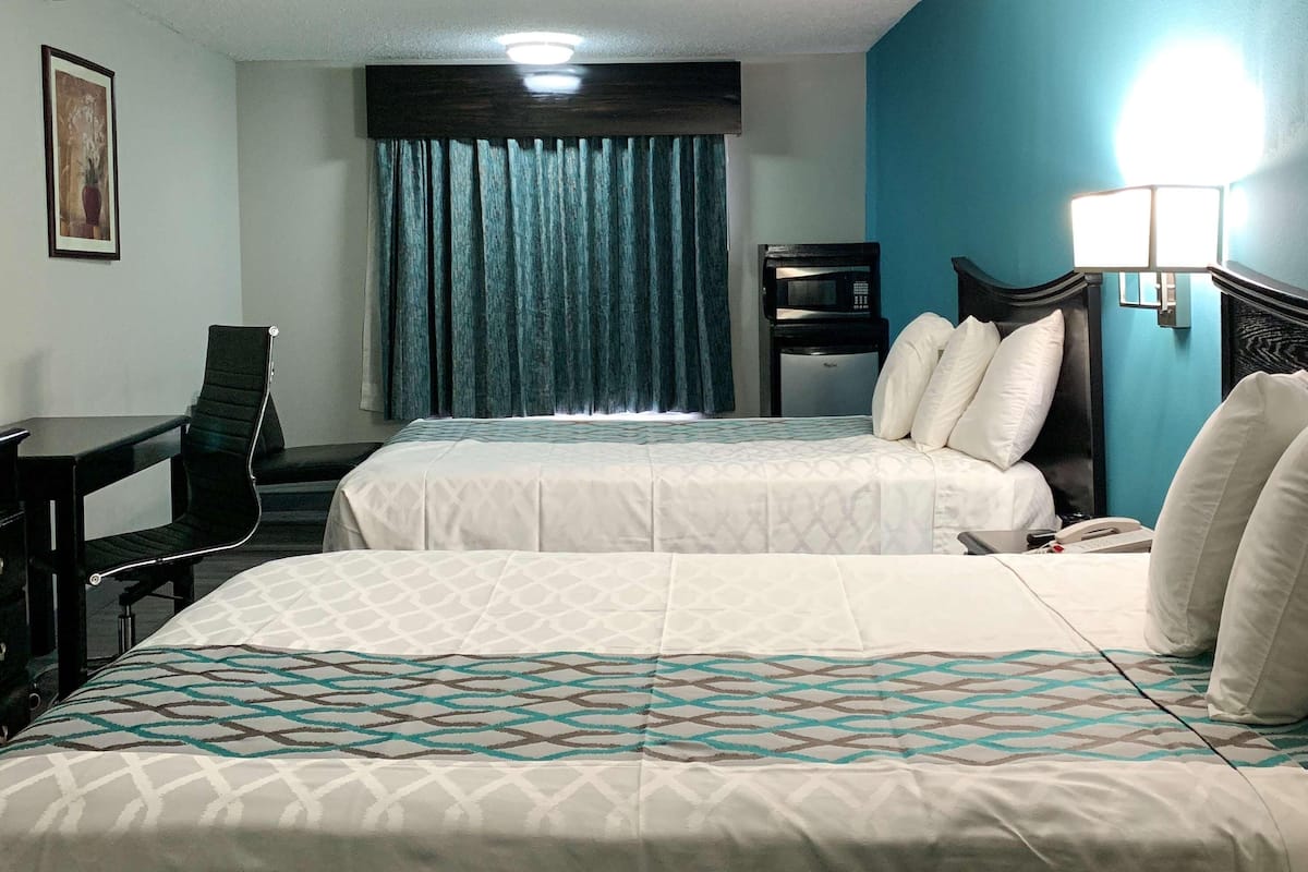 Desk, laptop workspace, WiFi (free), bed sheets