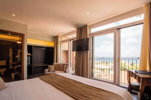 Camera Deluxe - Balcone Vista Mare | Frigobar, cofres nos quartos, escrivaninha
