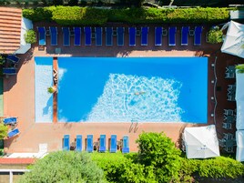 Seasonal outdoor pool, pool umbrellas, sun loungers