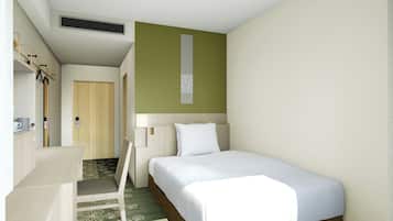 A modern hotel room with a single bed, a desk, and a chair.