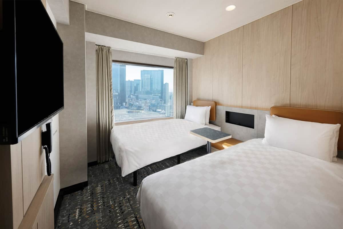 Premium bedding, down duvets, memory-foam beds, in-room safe