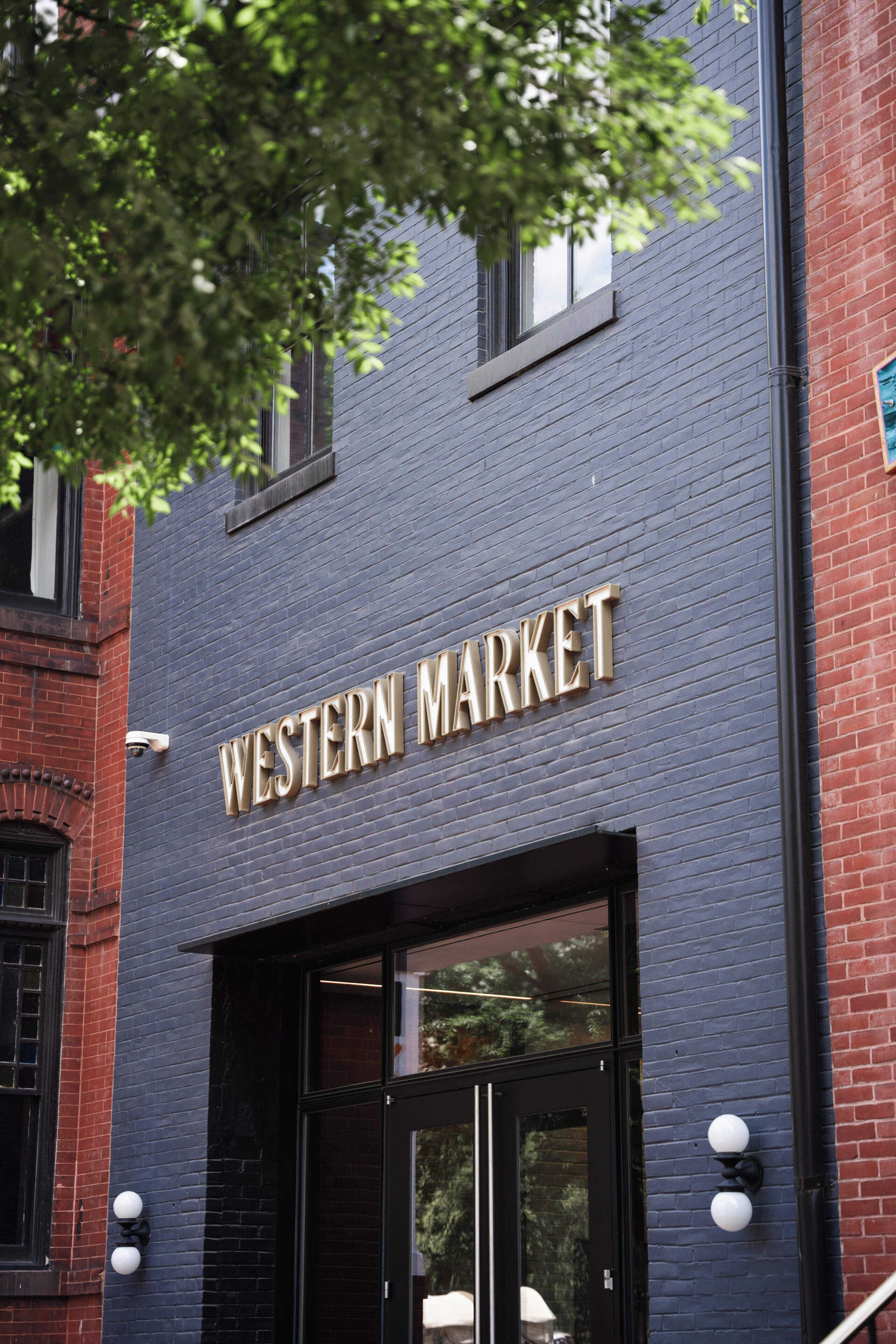A building facade with the sign "WESTERN MARKET" indicating a commercial establishment.