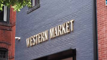A building facade with the sign "WESTERN MARKET" indicating a commercial establishment.