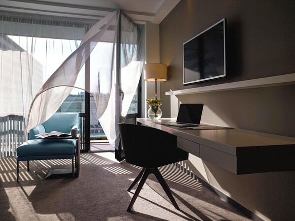 Premium bedding, in-room safe, desk, soundproofing
