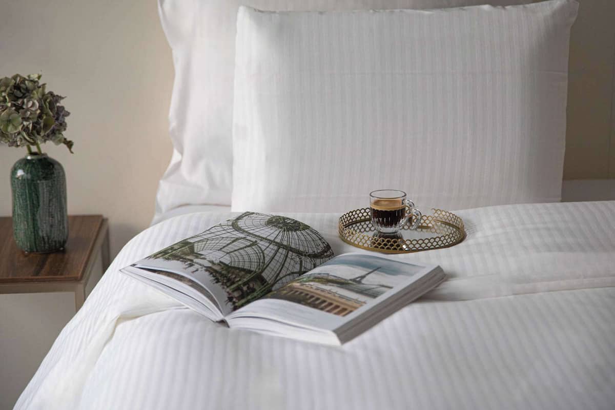 Premium bedding, in-room safe, desk, soundproofing