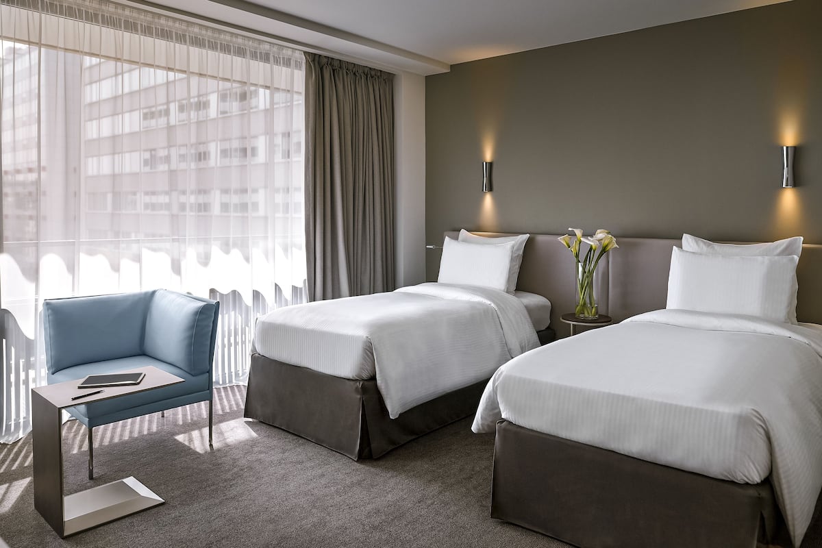 Premium bedding, in-room safe, desk, soundproofing