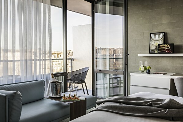 Premium bedding, in-room safe, desk, soundproofing