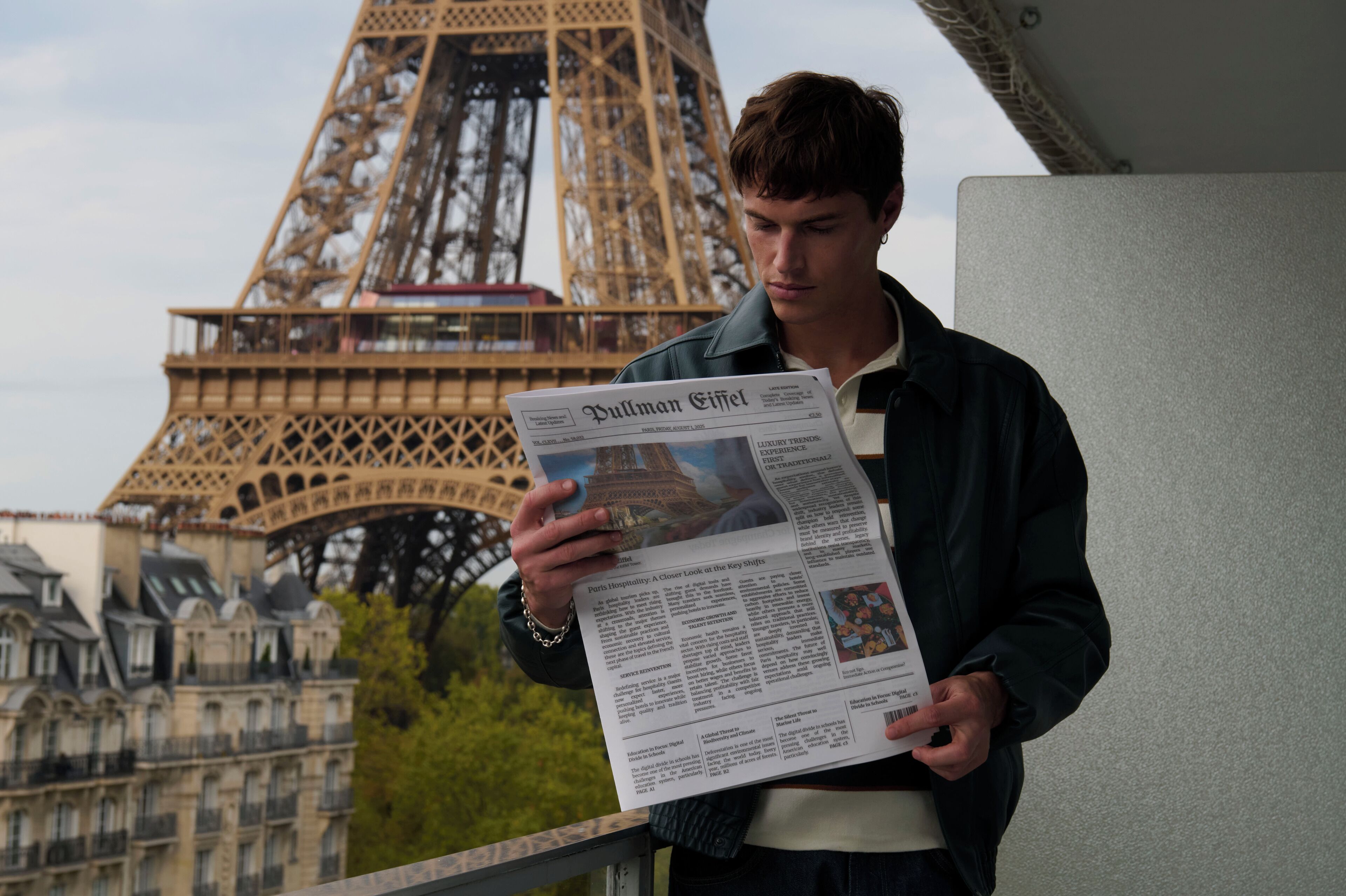A person reading a newspaper with the Eiffel Tower in the background.