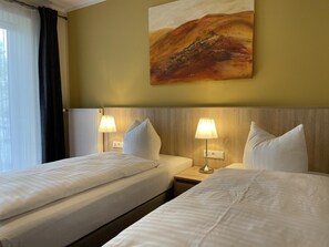 Standard Twin Room, Balcony | 1 bedroom, individually decorated, individually furnished, desk