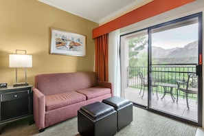 Signature Room, 1 King Bed, Non Smoking, Fireplace (with Sofabed) | Pillowtop beds, in-room safe, desk, laptop workspace