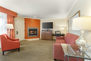 Signature Room, 1 King Bed, Non Smoking, Jetted Tub (with Sofabed) | Pillowtop beds, in-room safe, desk, laptop workspace