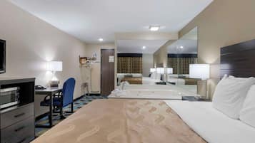 Standard Room, 1 King Bed, Jetted Tub | Desk, blackout drapes, iron/ironing board, free WiFi