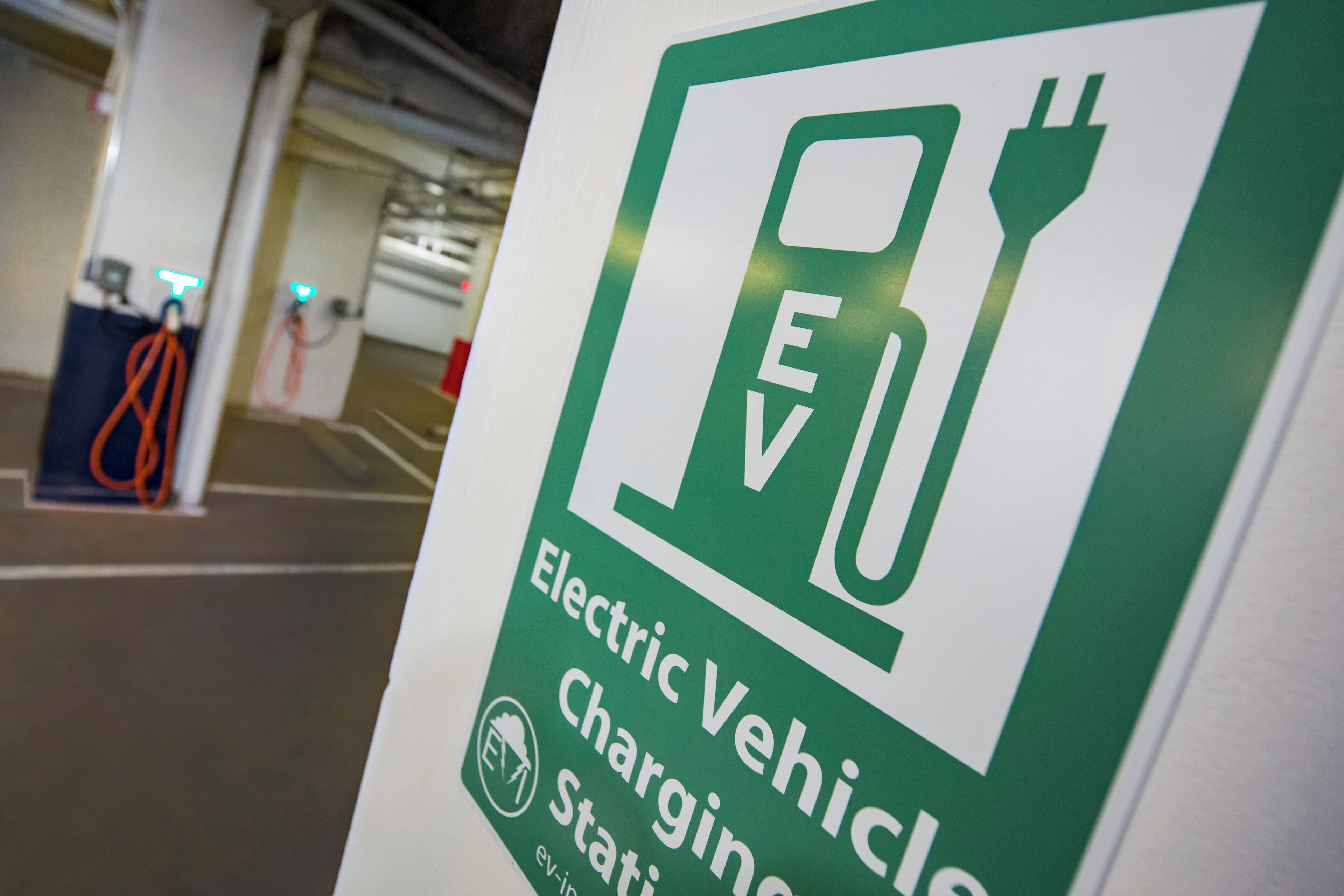 A sign indicating an electric vehicle charging station.