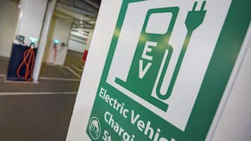 A sign indicating an electric vehicle charging station.