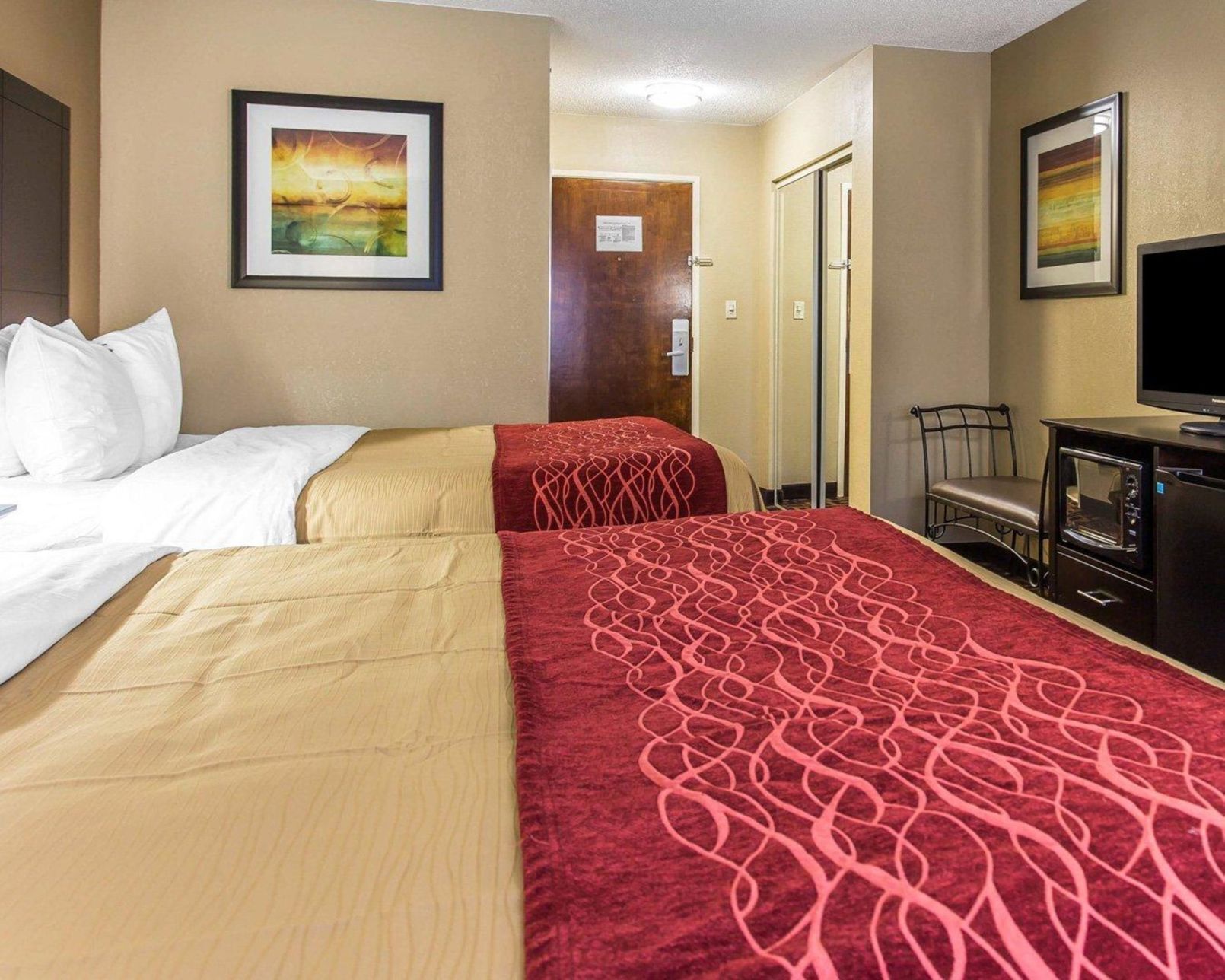 Premium bedding, down comforters, pillowtop beds, desk