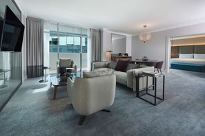 Premier Suite | Living area | 55-inch LED TV with cable channels, TV, pay movies