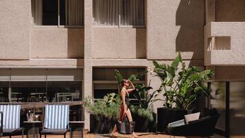 Outdoor pool, free cabanas, pool umbrellas