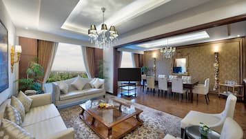 Presidential Suite, 1 King Bed | Living room | Plasma TV