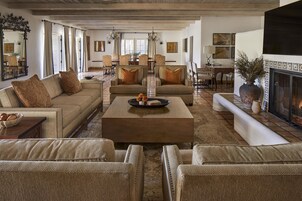 Suite, 1 King Bed with Sofa bed, Fireplace | Living area | 42-inch LCD TV with cable channels, TV