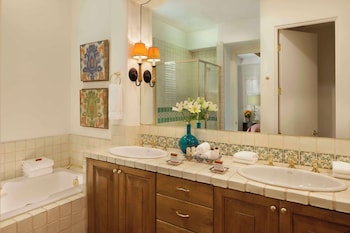 Separate tub and shower, designer toiletries, hair dryer, bathrobes at La Quinta Resort & Club, Curio Collection by Hilton