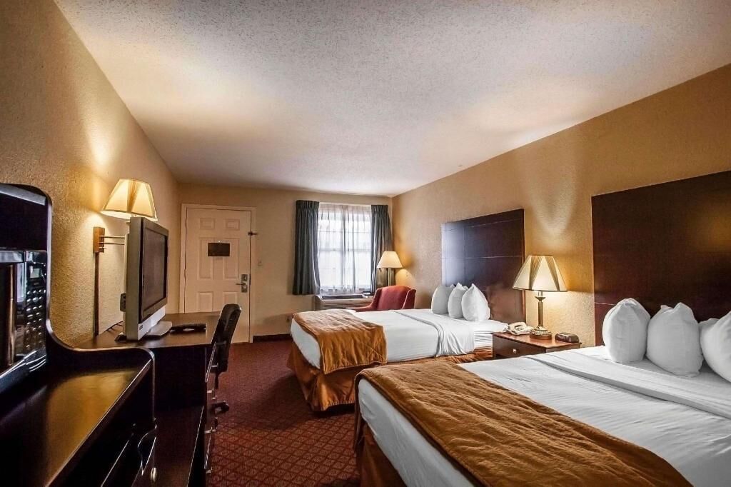 Premium bedding, pillow-top beds, blackout curtains, iron/ironing board